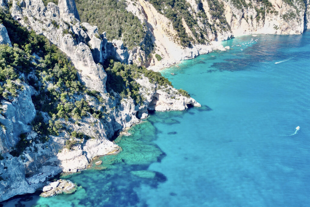 10 Trendy Beaches in Europe for 2026 Turquoise waters and limestone cliffs at Cala Goloritzé, Sardinia, Italy