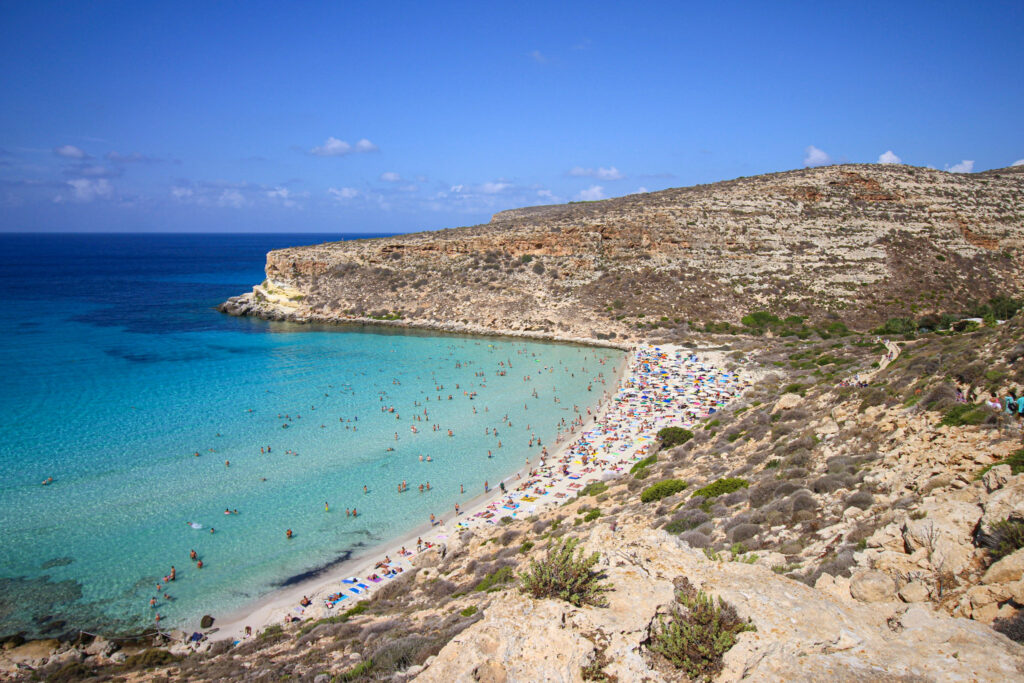 10 Trendy Beaches in Europe for 2026 Rabbit Beach's white sand and turquoise water on Lampedusa, Italy