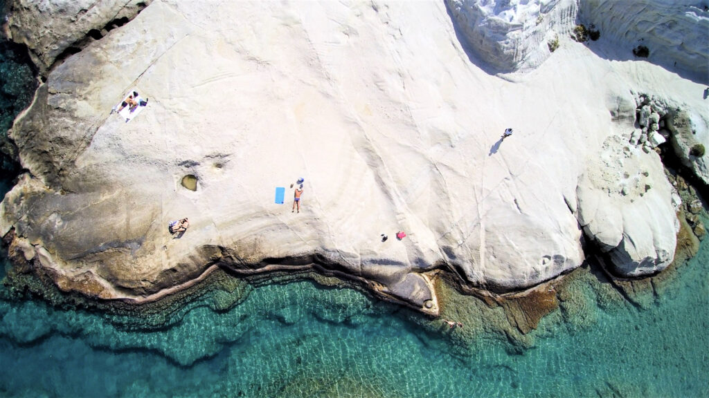 10 Trendy Beaches in Europe for 2026 Moon-like white volcanic rock formations at Sarakiniko Beach, Milos, Greece