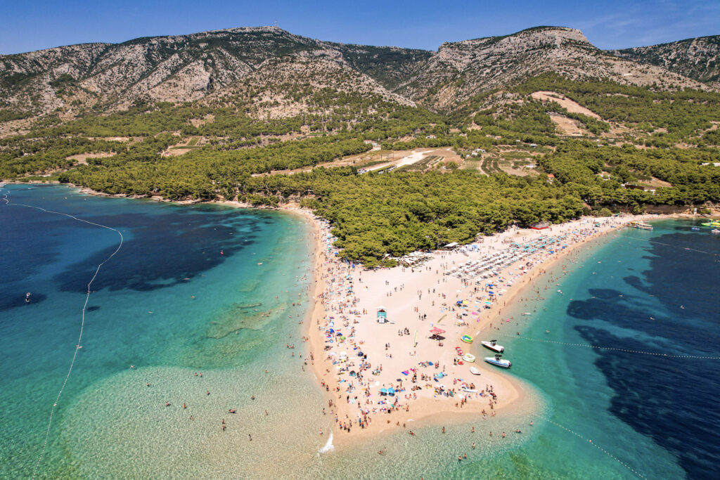 10 Trendy Beaches in Europe for 2026 Horn-shaped Zlatni Rat beach jutting into the sea in Brač, Croatia