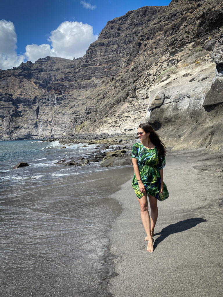 Top 10 Things to Do in Tenerife Walking along the black-sand beach beneath Los Gigantes cliffs, Tenerife