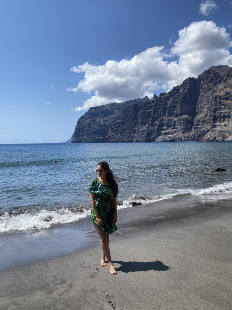Top 10 Things to Do in Tenerife Los Gigantes cliffs towering over the beach and sea, Tenerife
