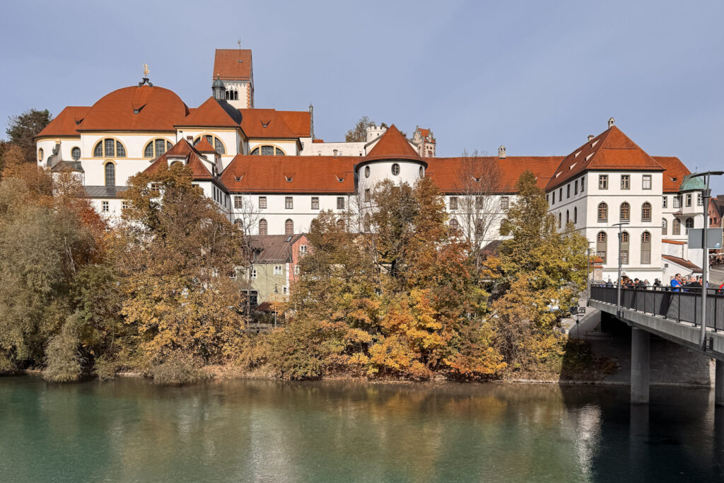 3 Days in Bavaria, Germany St Mang's Abbey in Füssen Germany overlooking the turquoise Lech River in autumn