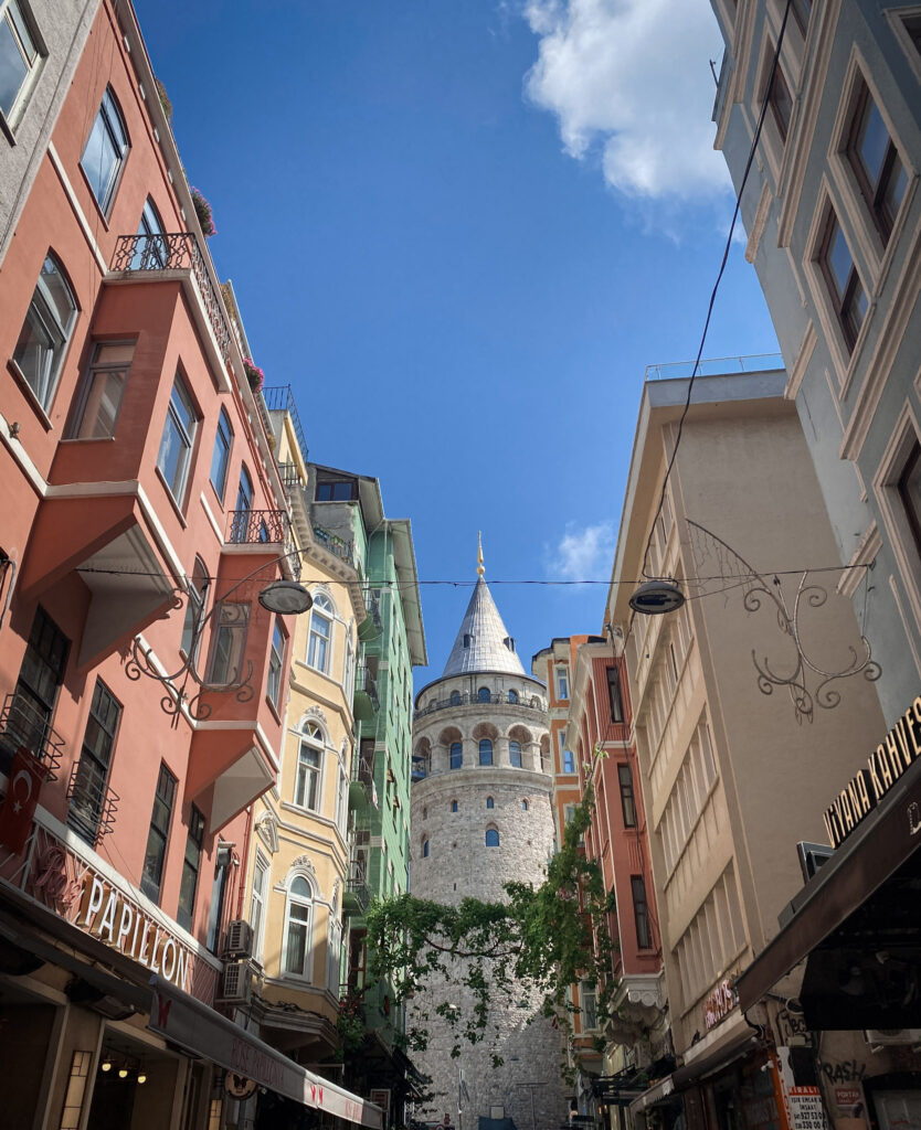 3 Days in Istanbul, Turkey The iconic Galata Tower viewed from Buyuk Hendek street near Viyana Kahvesi cafe under a blue sky