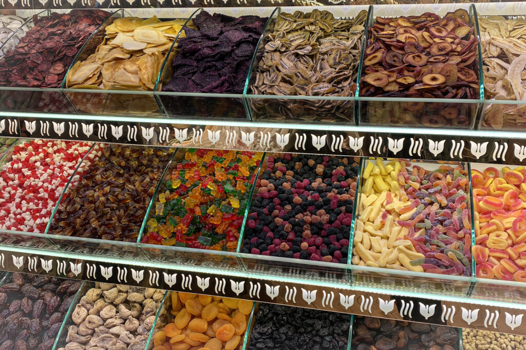 3 Days in Istanbul, Turkey Colorful displays of Turkish delights gummy candies and dried fruits inside an Istanbul bazaar