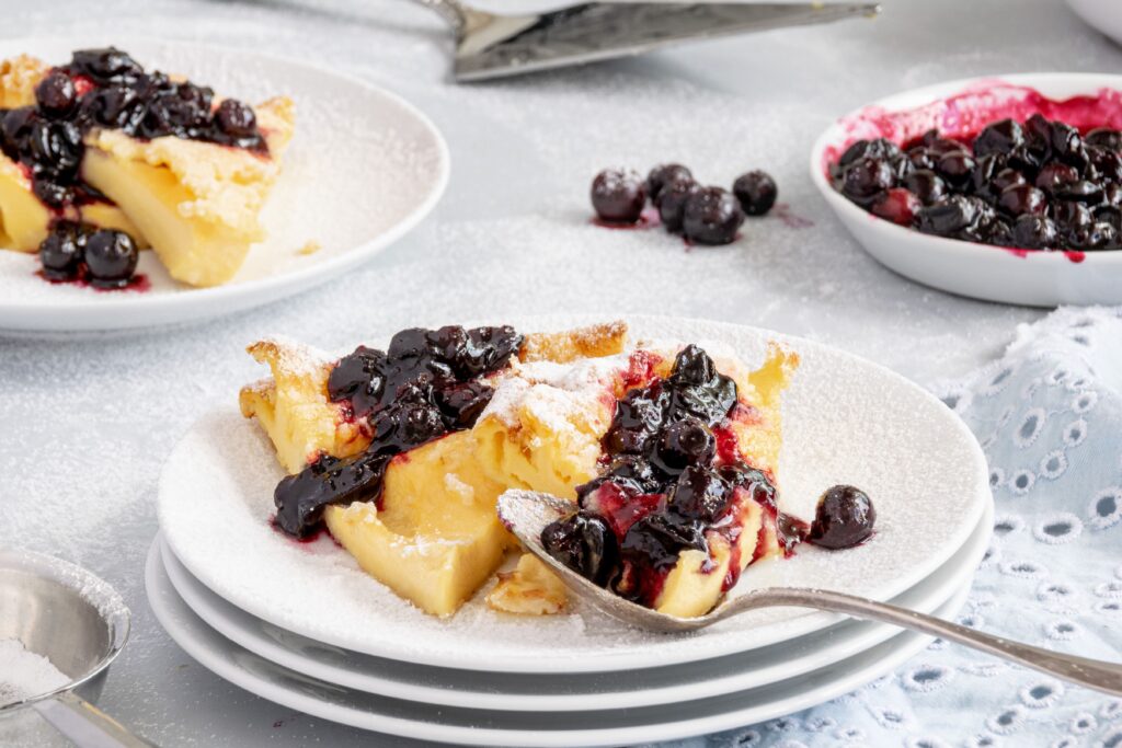 3 Days in Bavaria, Germany Traditional Austrian and Bavarian Kaiserschmarrn shredded pancake served with powdered sugar and blueberry compote