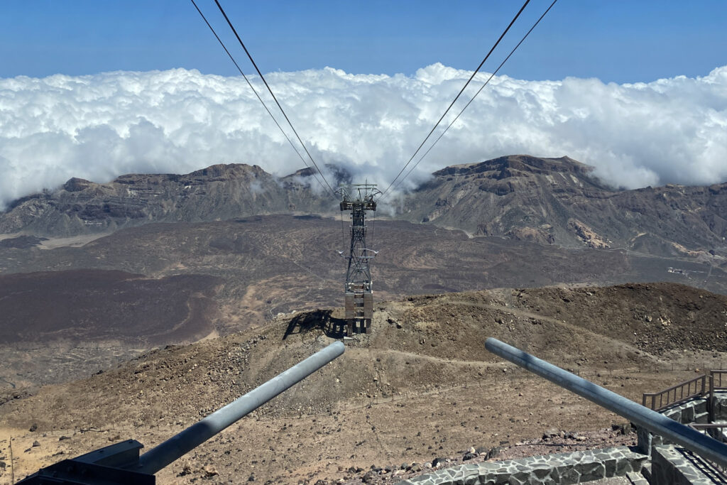 Top 10 Things to Do in Tenerife Cable car cables above the clouds at Mount Teide, Tenerife