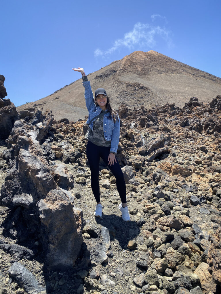 Top 10 Things to Do in Tenerife Standing on volcanic rock near the Mount Teide summit, Tenerife