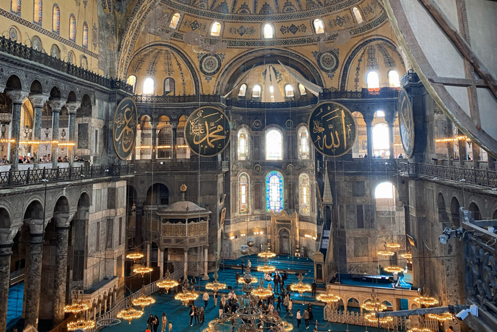 3 Days in Istanbul, Turkey The grand historic interior of Hagia Sophia mosque in Istanbul with Islamic calligraphy medallions viewed from the upper gallery