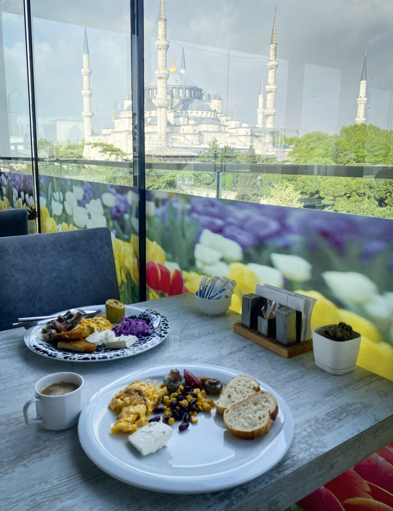 3 Days in Istanbul, Turkey Turkish breakfast plate with Blue Mosque view from restaurant window, Istanbul