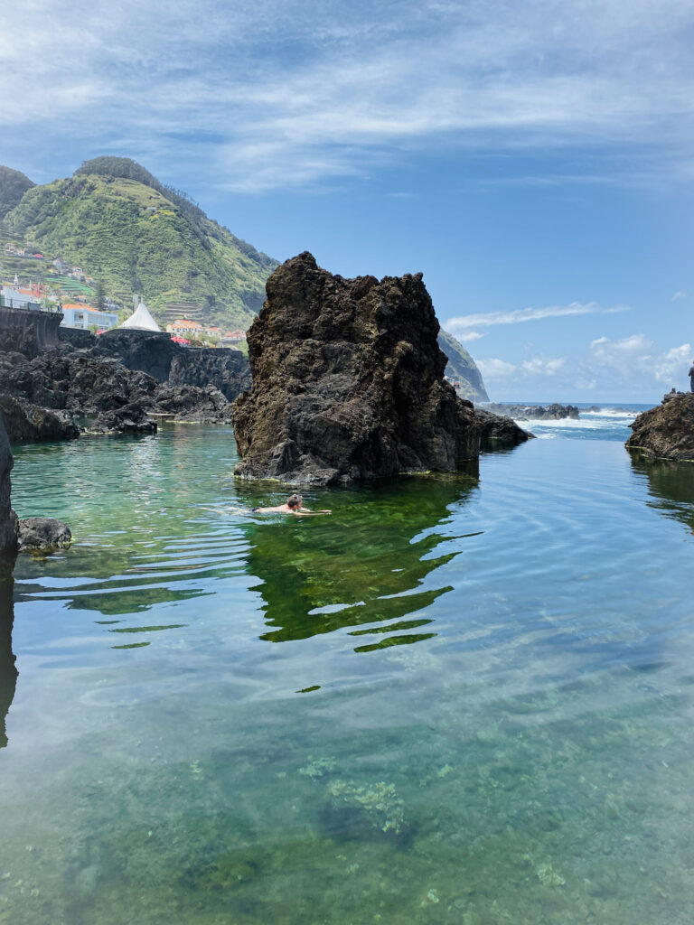 Madeira Travel Guide Natural volcanic swimming pool and massive sea rocks in Seixal, Madeira.