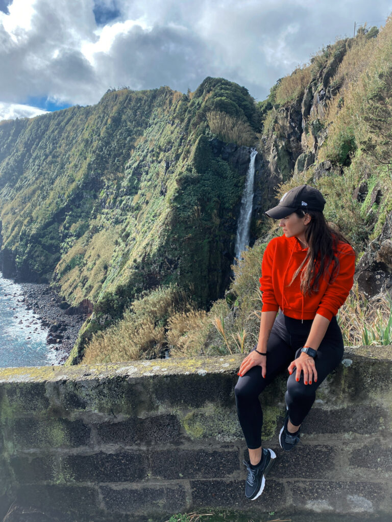 Top Things to Do in São Miguel, Azores Spectacular views of the Cascata da Ponta do Arnel waterfall during a scenic coastal hike on São Miguel Island.